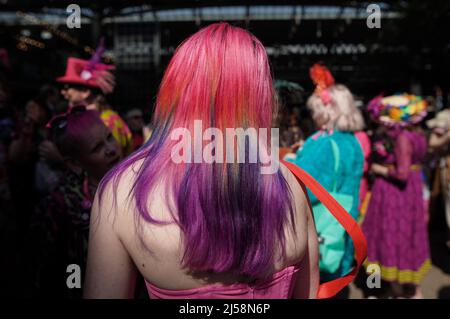 London, UK. 21st April 2022. London Colour Walk at Old Spitalfields Market. The monthly colour extravaganza gatherings continue at the Market with vivid subjects proudly displaying their homemade and eccentric dress. Organised by Florent Bidois since December 2016, the artist and fashion designer takes a lead role in inspiring the gatherings encouraging creative people who love colour and dressing up. Credit: Guy Corbishley/Alamy Live News Stock Photo