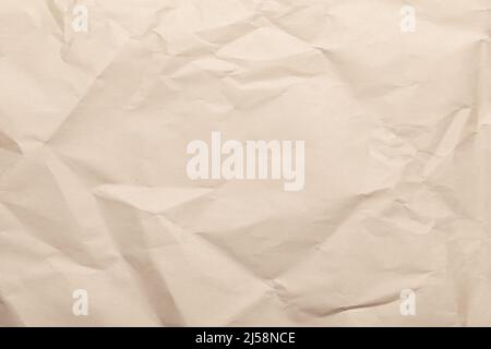 Sheet of brown wrinkled kraft made from recycled paper with texture and details Stock Photo
