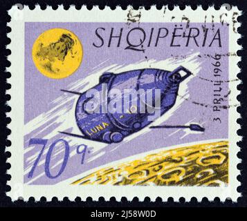 ALBANIA - CIRCA 1966: A stamp printed in Albania from the 'Luna 10' issue shows Luna 10, circa 1966. Stock Photo