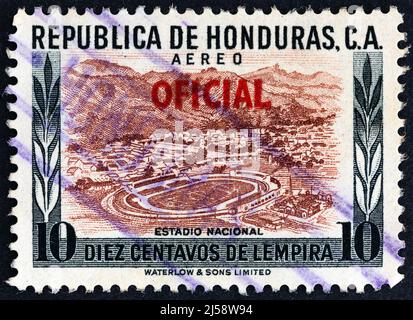HONDURAS - CIRCA 1956: A stamp printed in Honduras shows National stadium, circa 1956. Stock Photo