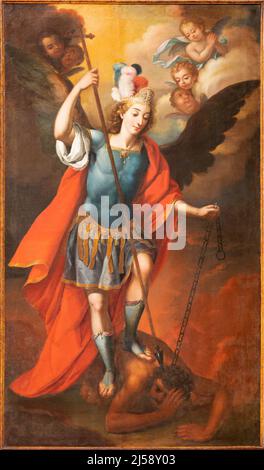 VALENCIA, SPAIN - FEBRUAR 17, 2022: The painting of St. Michael Archanel in the church Iglesia de San Marín by unknown baroque artist. Stock Photo
