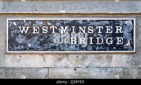 Old street sign on Westminster Bridge, london. The bridge opened in 1862 and spans the River Thames between Lambeth and Wesiminster. Stock Photo