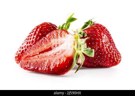 Three fresh strawberries on an isolated white background. Stock Photo