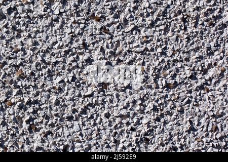 Closeup view of roughcast house wall for background Stock Photo