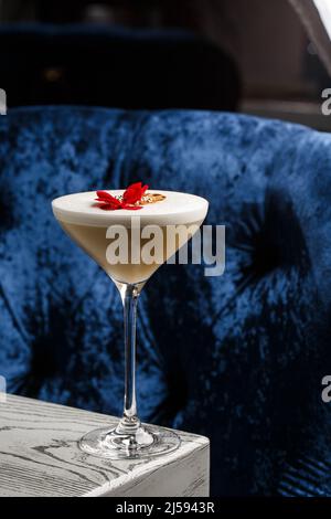 Coffee cocktails and liquor on blue reflective background. Copy space for your text Stock Photo