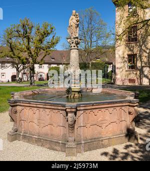 The inner courtyard of the Lichtental Abbey with St. Mary‘s fountain in Baden Baden. Baden Wuerttemberg, Germany, Europe Stock Photo