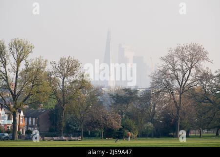 South London properties and the Shard, seen from Ruskin Park, a south London green space in Lambeth, on 21st April 2022, in London, England. Stock Photo