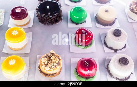 Colorful colourful round cakes Oreo on display in Madrid, Spain Stock Photo