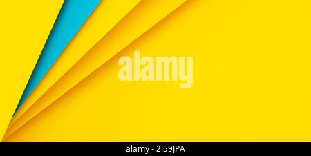 Abstract colored papers geometry flat lay composition background with blue and yellow colors Stock Photo
