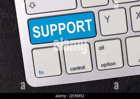 Support on a keypad conceptual for support service Stock Photo