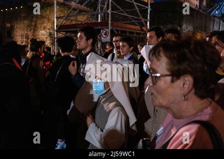 Easter ceremony and torchlight procession at the foot of the hill in the presence of Pope Francis. Italy, Rome. Stock Photo