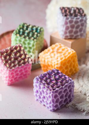 Bright colorful handmade soy candles. Handmade soy candles of unique design, with different colors. Relaxation atmosphere. Luxurious lifestyle. Select Stock Photo