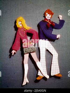 1960s 1970s CLOTH AND CARDBOARD CUTOUT MONTAGE OF TEENAGE COUPLE BOY AND GIRL DANCING - kd2933 PHT001 HARS SOUND CELEBRATION STUDIO SHOT HEALTHINESS COPY SPACE FRIENDSHIP FULL-LENGTH PERSONS CLOTH CUTOUT TEENAGE GIRL TEENAGE BOY ENTERTAINMENT HAPPINESS CARDBOARD STYLES AND EXCITEMENT RECREATION REDHEAD MINI-SKIRT CONNECTION RED HAIR CONCEPTUAL BELL BOTTOMS STYLISH TEENAGED ARTWORK FASHIONS YOUNG ADULT MAN YOUNG ADULT WOMAN CAUCASIAN ETHNICITY COMPOSITION OLD FASHIONED Stock Photo