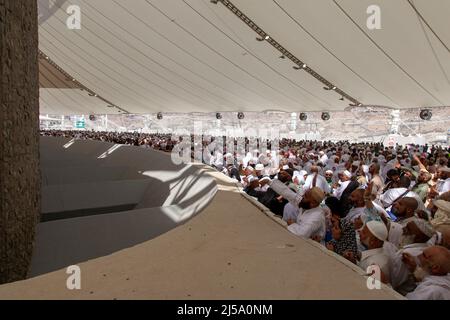 Pilgrims performing the stoning ritual during Hajj  in Makkah Saudi Arabia Stock Photo