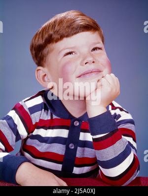 1960s CUTE LITTLE BOY SMILING DAYDREAMING RESTING CHIN ON HIS HAND LOOKING UP WEARING STRIPED T-SHIRT WISHING HOPEFUL EXPRESSION - kj2032 HAR001 HARS STUDIO SHOT HEALTHINESS HOME LIFE COPY SPACE PENSIVE THOUGHTFUL MALES CHIN CONFIDENCE WISHING EXPRESSIONS RESTING BRUNETTE DAYDREAMING DREAMS HAPPINESS HEAD AND SHOULDERS CHEERFUL HIS HOPE EXPECTATION REFLECTIVE THINK HOPEFUL PRIDE UP REFLECTING SMILES PONDER PONDERING CONSIDER HOPING LOST IN THOUGHT CONCEPTUAL IMAGINATION JOYFUL CONTEMPLATIVE T-SHIRT WISH MEDITATE ASPIRATION GROWTH IDEAS JUVENILES MEDITATIVE CAUCASIAN ETHNICITY CONSIDERING Stock Photo