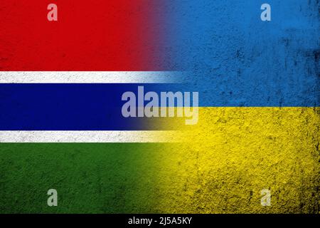 The Republic of The Gambia National flag with National flag of Ukraine. Grunge background Stock Photo