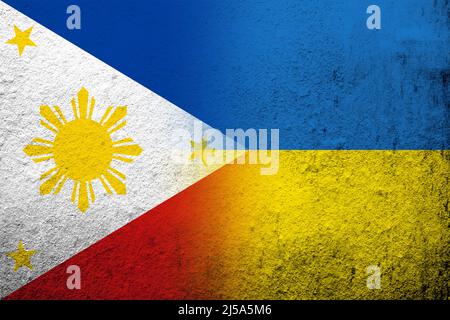 The Republic of the Philippines National flag with National flag of Ukraine. Grunge background Stock Photo