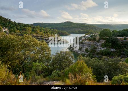 View of the banks of Lac d'Esparron at sunset in the Verdon region of Provence in the south of France . Stock Photo
