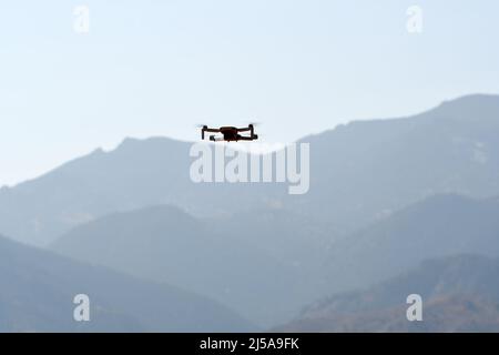 PARK RANGER: A drone surveils the beautiful mountainous region at the Garden of the Gods state park in Colorado Springs, Colorado. Stock Photo