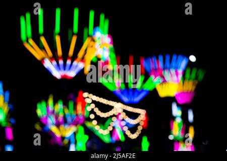 Blured Multi-colored neon lights at night. Stock Photo