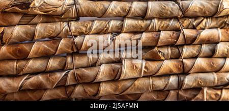 Wicker crafts basket background with shadows. Natural texture background. High quality photo Stock Photo