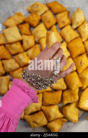 a girl's hand with Kazakh jewelry. Stock Photo