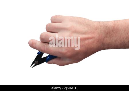 The instrument is in the right hand of a man on a white background. Stock Photo