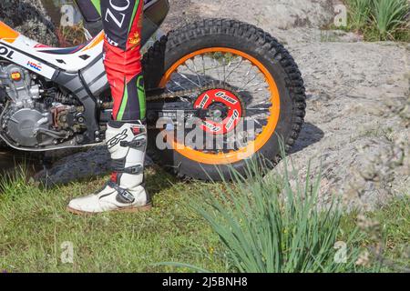 Merida, Spain - April 10th, 2022: Motorcycle trial Extremadura Championship. Prod on grass Stock Photo