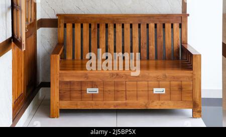 a simple, vintage handcrafted wooden futon Stock Photo