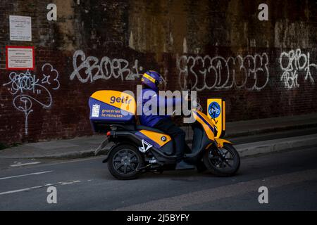 A Getir courier on a moped Stock Photo