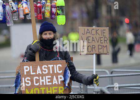 London, UK. 25th January 2022. Anti-plastics campaigner - in Parliament Square daily -  with a new sign : Jackie Weaver for PM