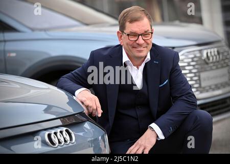 Tegernsee, Germany. 22nd Apr, 2022. Markus DUESMANN (Management Chairman of AUDI AG) poses at the front of an Audi e-tron gt quattro. Ludwig Erhard Summit 2022 at Gut Kaltenbrunn am Tegernsee on April 21, 2022. Credit: dpa picture alliance/Alamy Live News Stock Photo