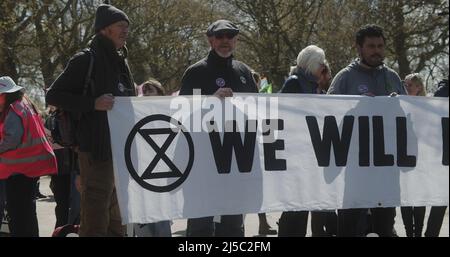 London, UK - 04 09 2022:  Climate protesters, Extinction Rebellion, getting ready to march through London, holding banner, ‘We Will Not Be Bystanders'. Stock Photo