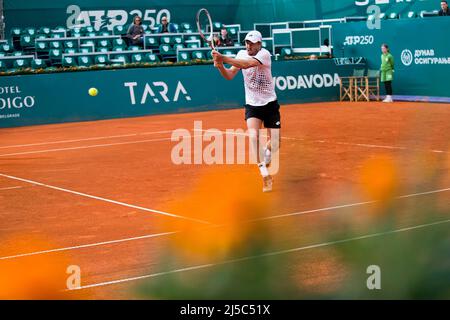 Belgrade, Serbia, 20th April 2022. John Millman of Australia returns against Miomir Kecmanovic of Serbia during the day three of Serbia Open ATP 250 Tournament at Novak Tennis Centre in Belgrade, Serbia. April 20, 2022. Credit: Nikola Krstic/Alamy Stock Photo