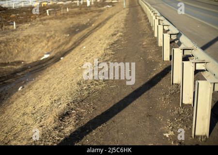 Side of road. Highway details. Bumper along road. Stock Photo