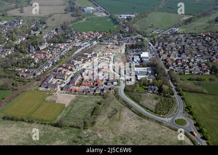 aerial view of a new housing development built on the site of the former Dunlopillow factory at Pannal, near Harrogate, North Yorkshire, UK Stock Photo