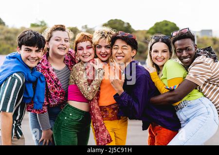 Happy young diverse friends having fun hanging out together - Youth people millennial generation concept