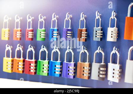 Colored code padlocks in the store Stock Photo