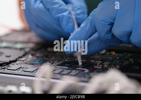 Cpu microchip processor with thermal paste closeup Stock Photo