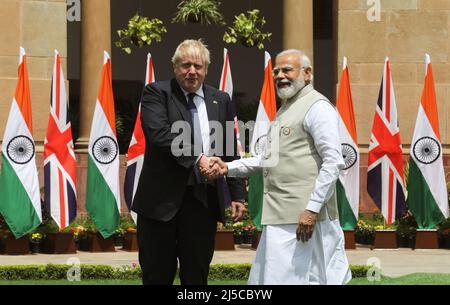 Indian Prime Minister Narendra Modi (R) and British Prime Minister Boris Johnson (L) shake hands at the Hyderabad House before their meeting in Delhi. The UK Prime Minister is on a two-day visit to India. He said India specific open general export license for defence procurement after meeting with Indian Prime Minister Narendra Modi. (Photo by Naveen Sharma / SOPA Images/Sipa USA) Stock Photo