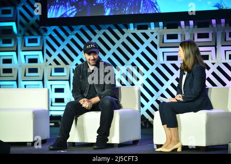 Miami Beach, FL, USA. 18th Apr, 2022. Alexis Ohanian, Co-founder and Former Executive Chairman, Reddit & Founder of Seven Seven Six and Deirdre Bosa, Co-Anchor of 'TechCheck' of CNBC attend eMerge Americas 2022 at the Miami Beach Convention Center on April 18, 2022 in Miami Beach, Florida. Credit: Mpi10/Media Punch/Alamy Live News Stock Photo