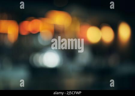Defocused bokeh abstract dark background Stock Photo