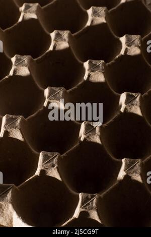 Abstract background. frame geometry. Egg packaging. Paper tray for domestic eggs. Beige and grey. Minimalism. Paper packaging egg carton Stock Photo