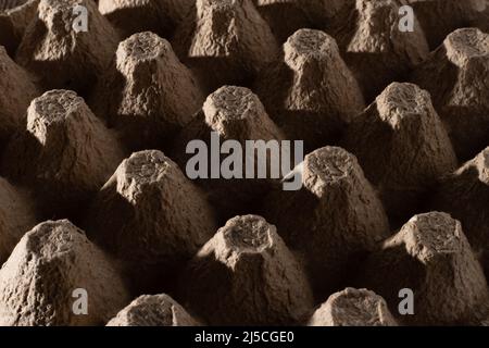 Abstract background. frame geometry. Egg packaging. Paper tray for domestic eggs. Beige and grey. Minimalism. Paper packaging egg carton Stock Photo