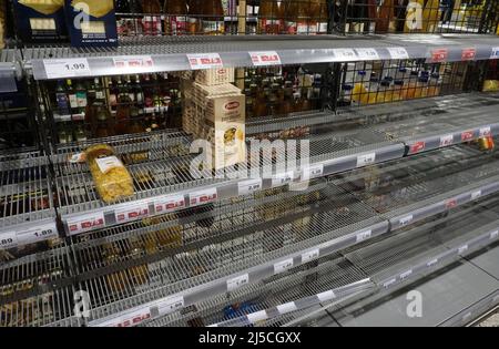 Empty shelf in a Berlin supermarket. Hamster purchases due to coronavirus. [automated translation] Stock Photo