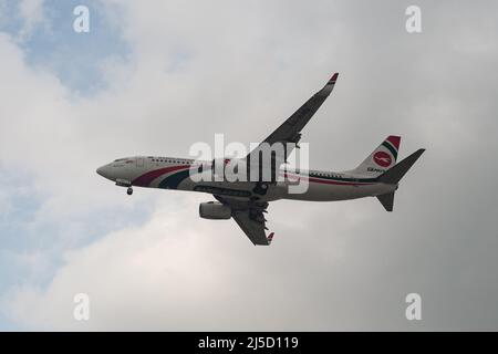 Apr. 03, 2021, Singapore, Republic of Singapore, Asia - A Biman Bangladesh Airlines Boeing 737-800 passenger aircraft with registration S2-AHV on approach to Changi International Airport during the ongoing Corona crisis. [automated translation] Stock Photo