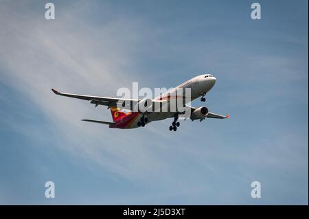 Nov. 29, 2021, Singapore, Republic of Singapore, Asia - A Hong Kong Airlines Airbus A330-300 passenger aircraft with registration B-LNN on approach to Changi International Airport. [automated translation] Stock Photo