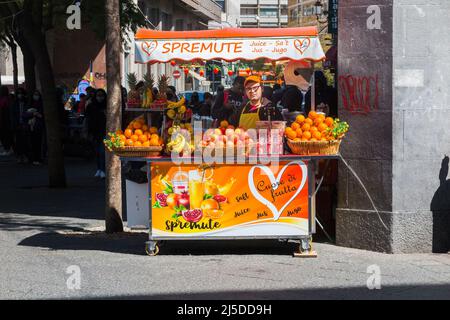 Orange juice seller with fresh squeezed juice, in the street in Catania, Sicily, Italy. (129) Stock Photo