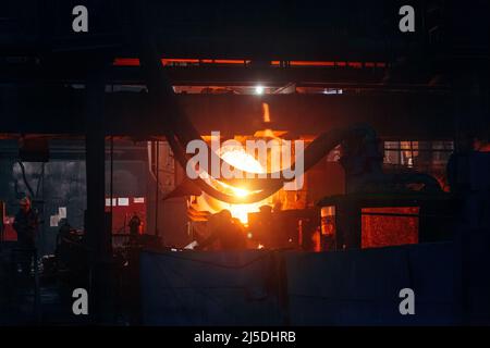 Metal casting process in metallurgical plant Stock Photo