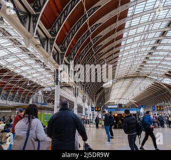People walking and waiting for trains at Paddington Station Praed St, London, UK Stock Photo